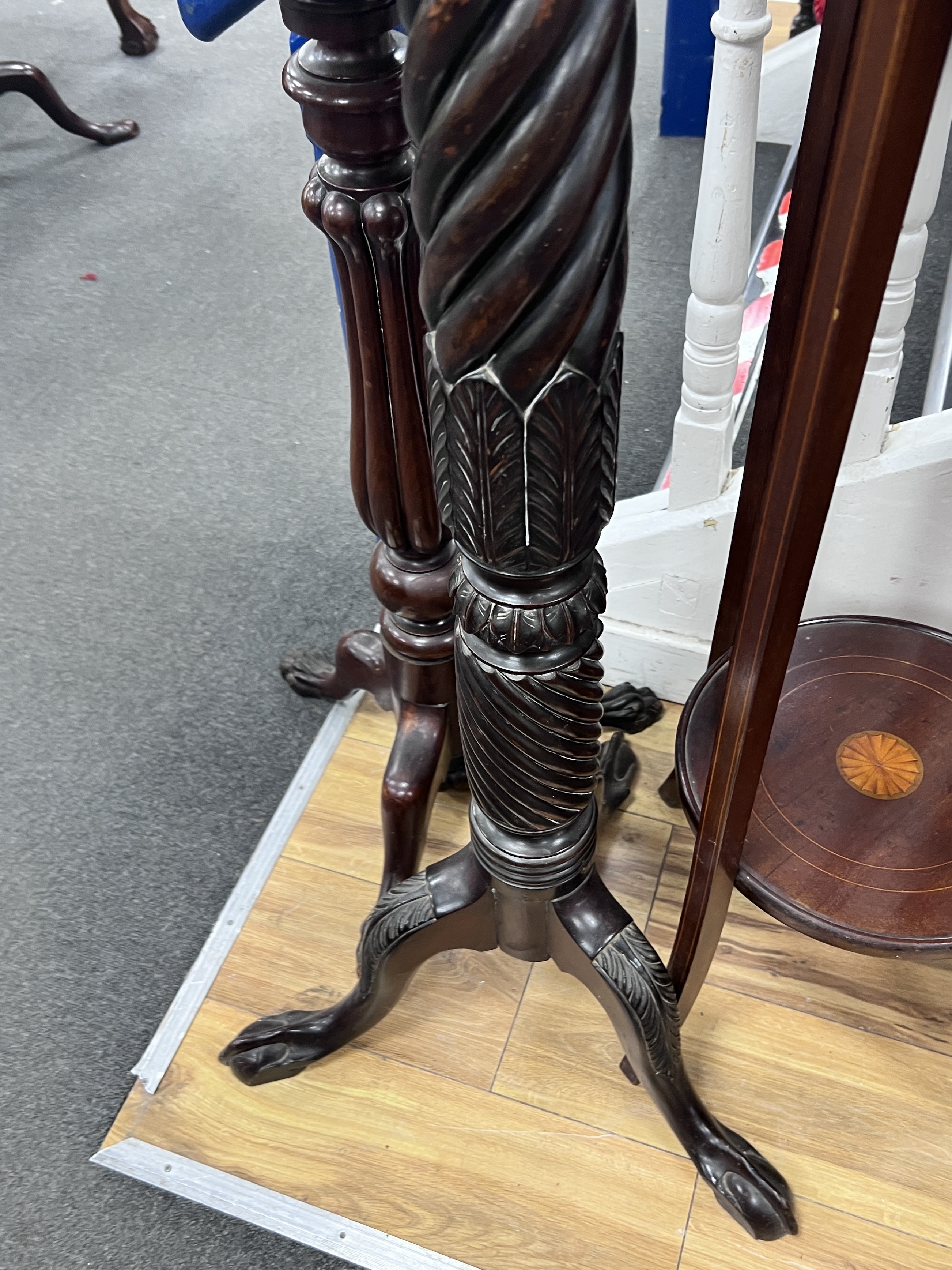 A George III style mahogany torchere, a mahogany plant stand and one other, largest height 149cm